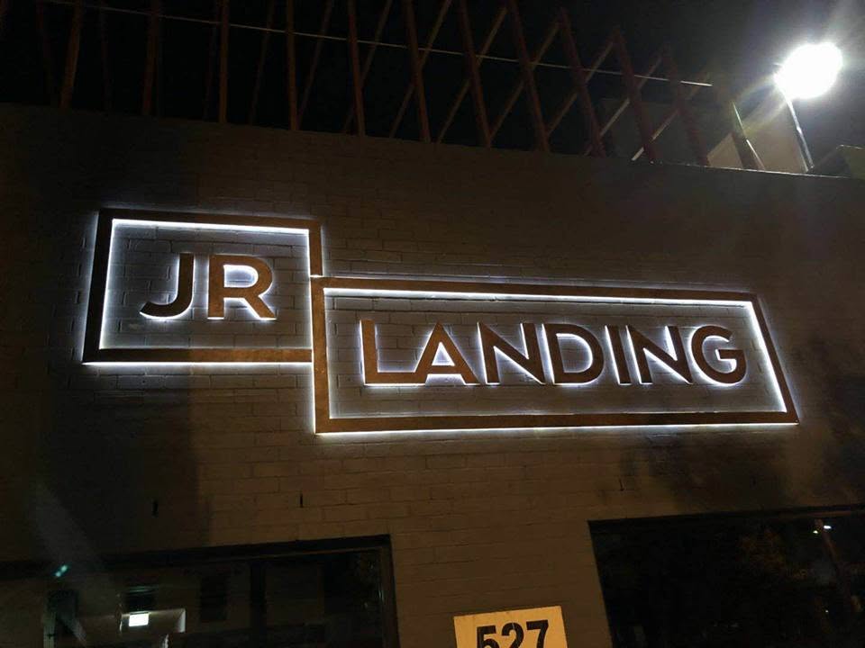 Backlit steel letters for JR Landing at night