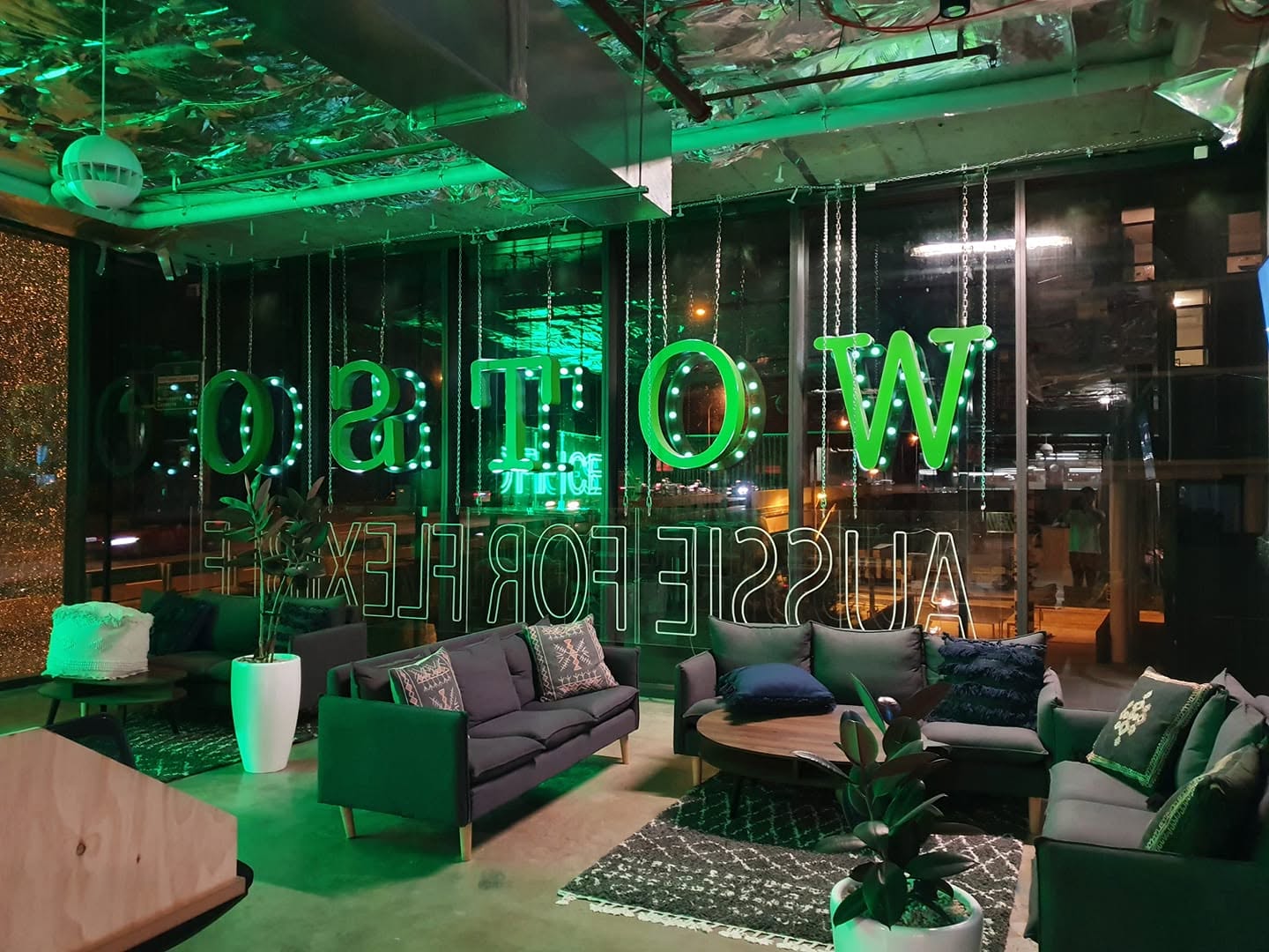 Chain-hung marquee letters and neon lettering for WOTSO